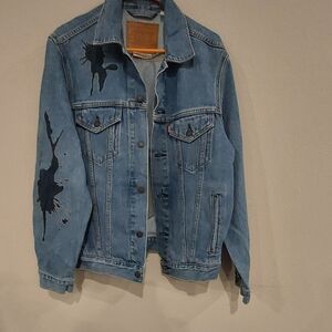 Levi womens med blue jean jacket with cartoon  paint splatters deign